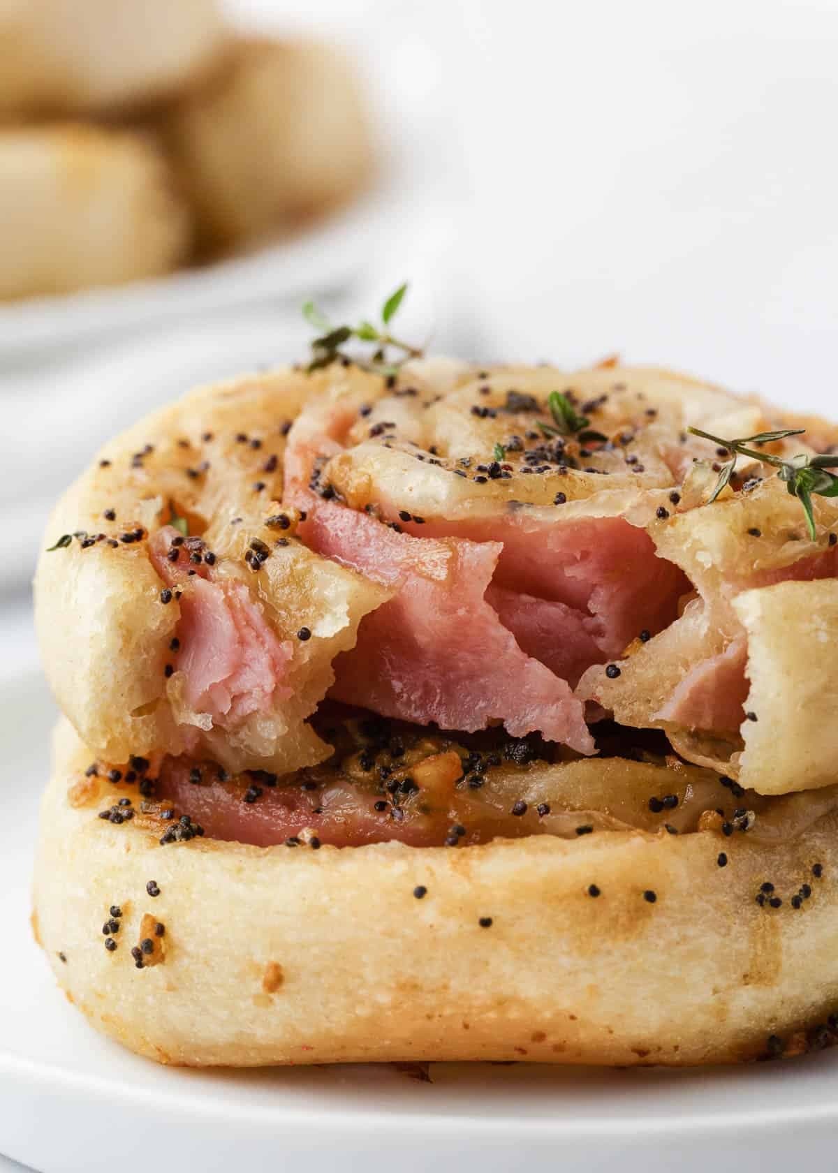 Baked Ham and Cheese Pinwheels with Dijon Poppy Seed Butter