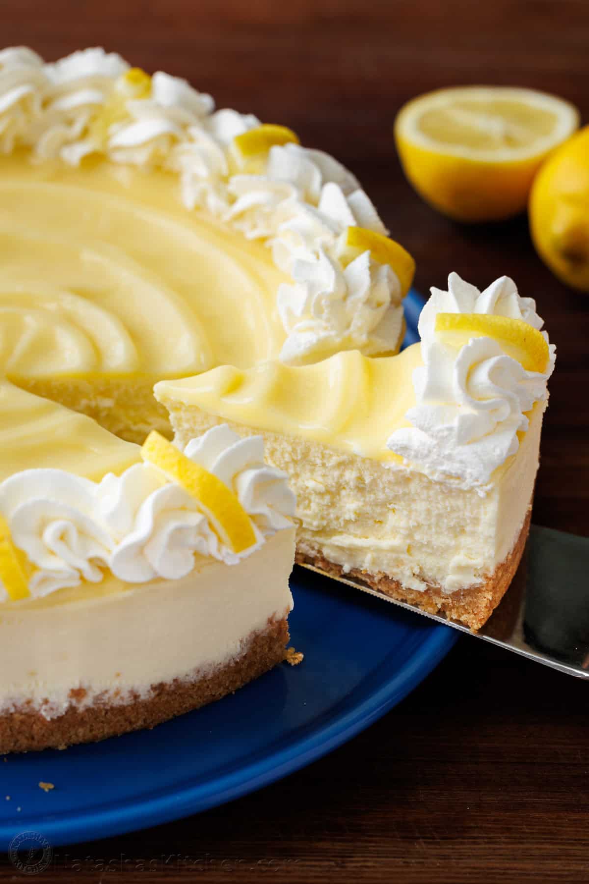Lemon Cheesecake with Tangy Lemon Curd and Whipped Cream