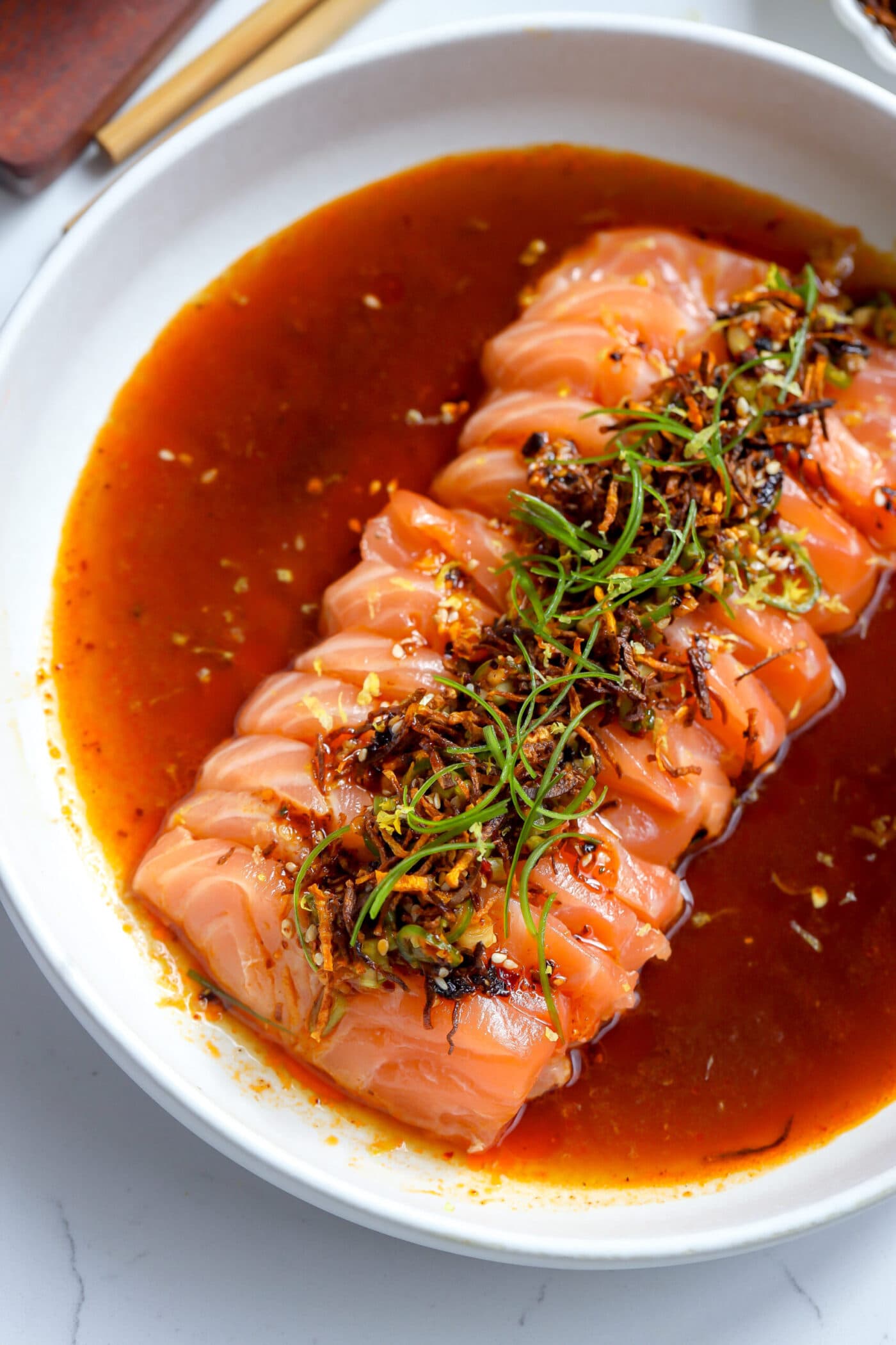 Spicy Salmon Crudo with Crispy Carrots and Citrus Tamari Sauce