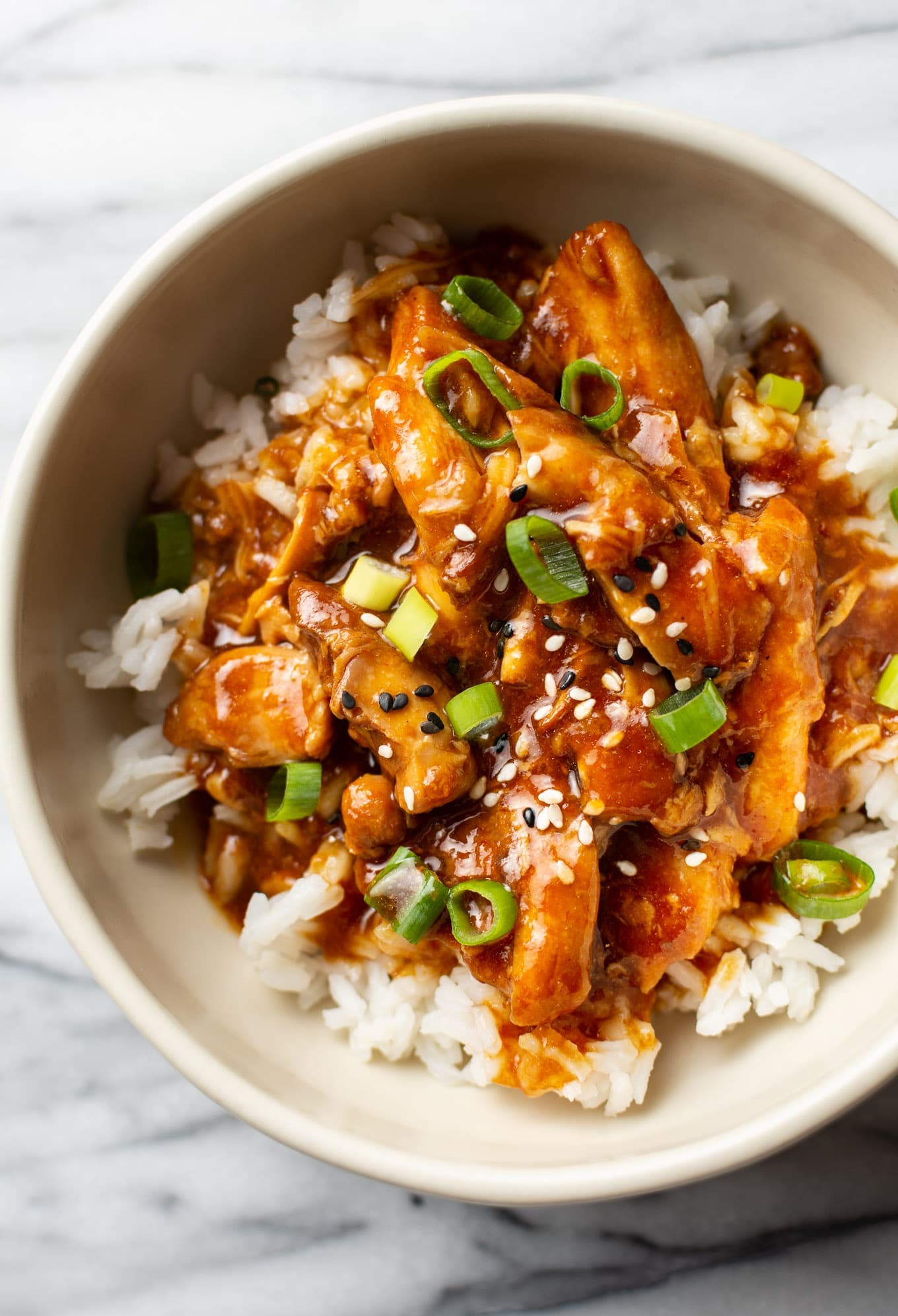 Honey Garlic Slow Cooker Chicken Thighs with Sweet-Savory Ginger Sauce